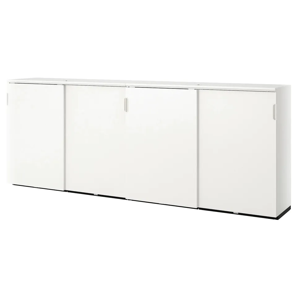 A white GALANT office storage cabinet with sliding doors.