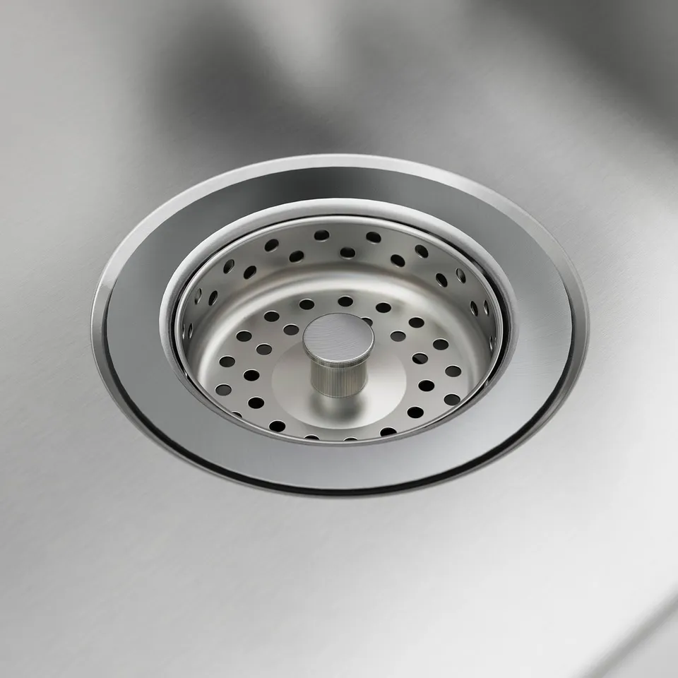 Stainless steel sink drain with strainer; durable, smooth, and clean.