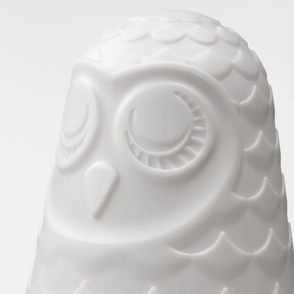 Owl lamp with large eyes and texture detail.