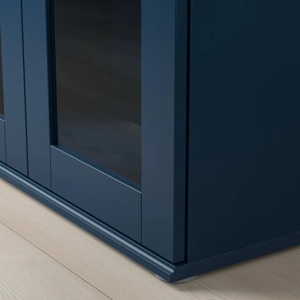 Close-up of blue cabinets corner, showcasing sleek design, clean lines, and durable finish.