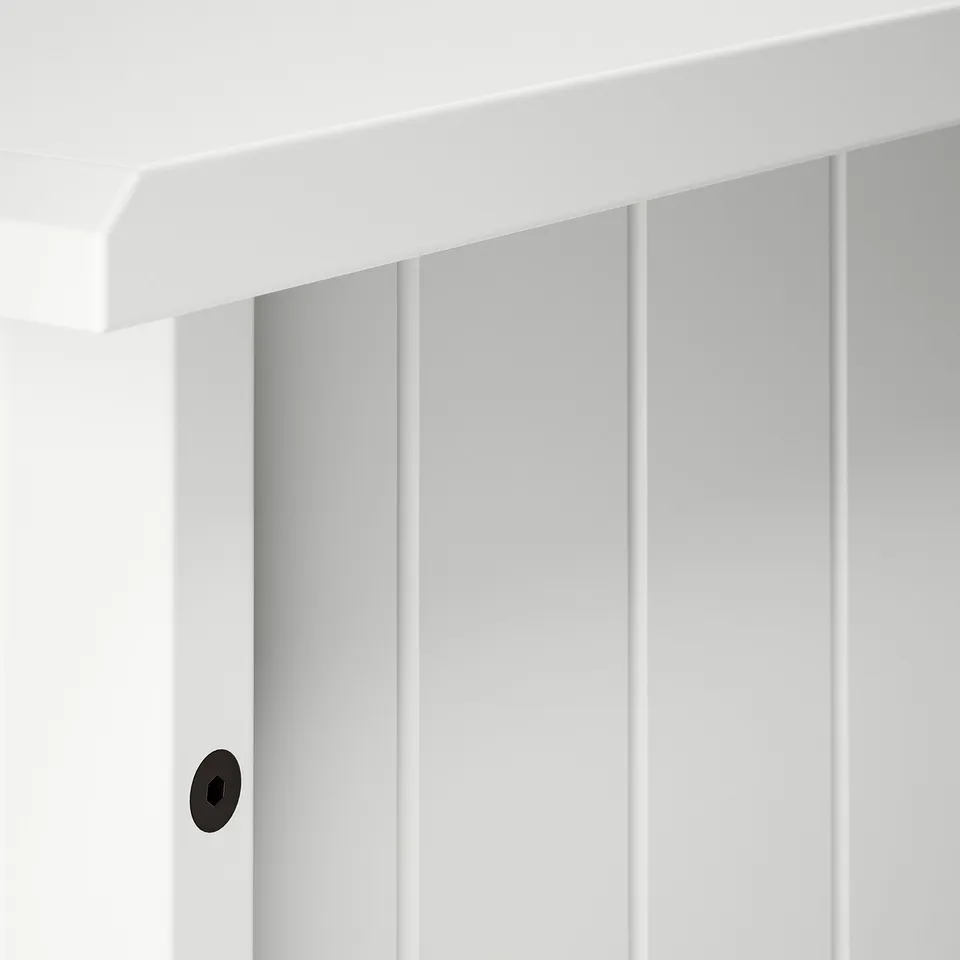 Modern white wooden desk; sleek, clean lines; minimalist design.