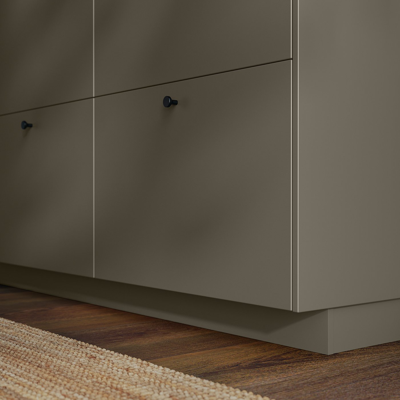 Modern grey HAVSTORP cabinet set with sleek, straight lines and smooth surfaces, including plinth for uniform look.