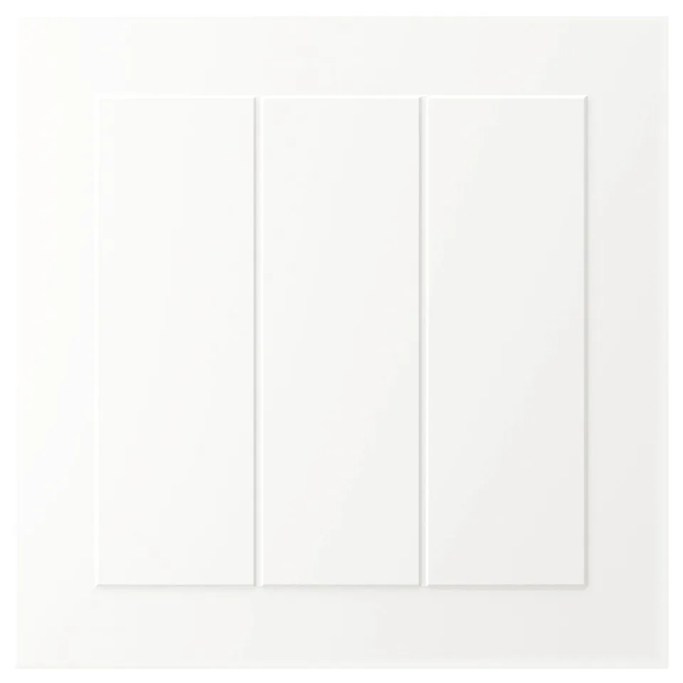 White STENSUND cabinet with grooved panels and smooth surface.