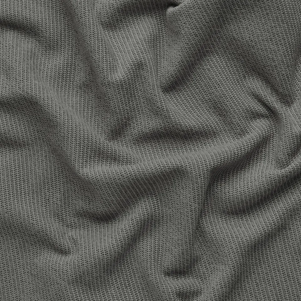 Close-up of soft, textured, grey fabric showing high-quality weave and texture.