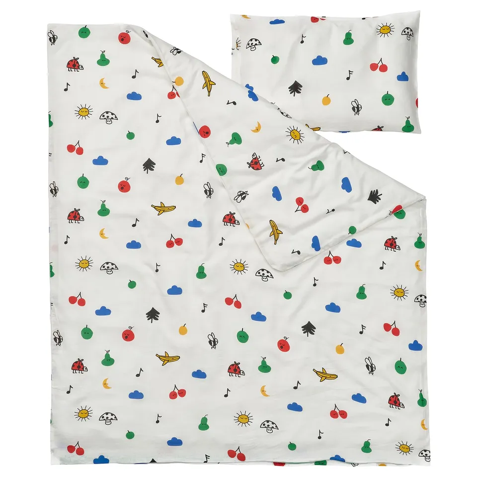 White GRÖNFINK baby duvet set with fruits, bugs, clouds, notes, zip.
