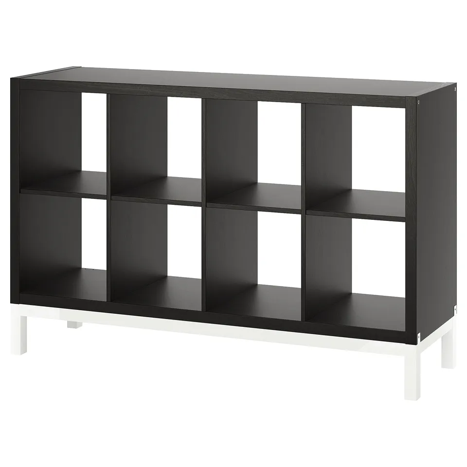KALLAX black sideboard with open shelves and white frame.
