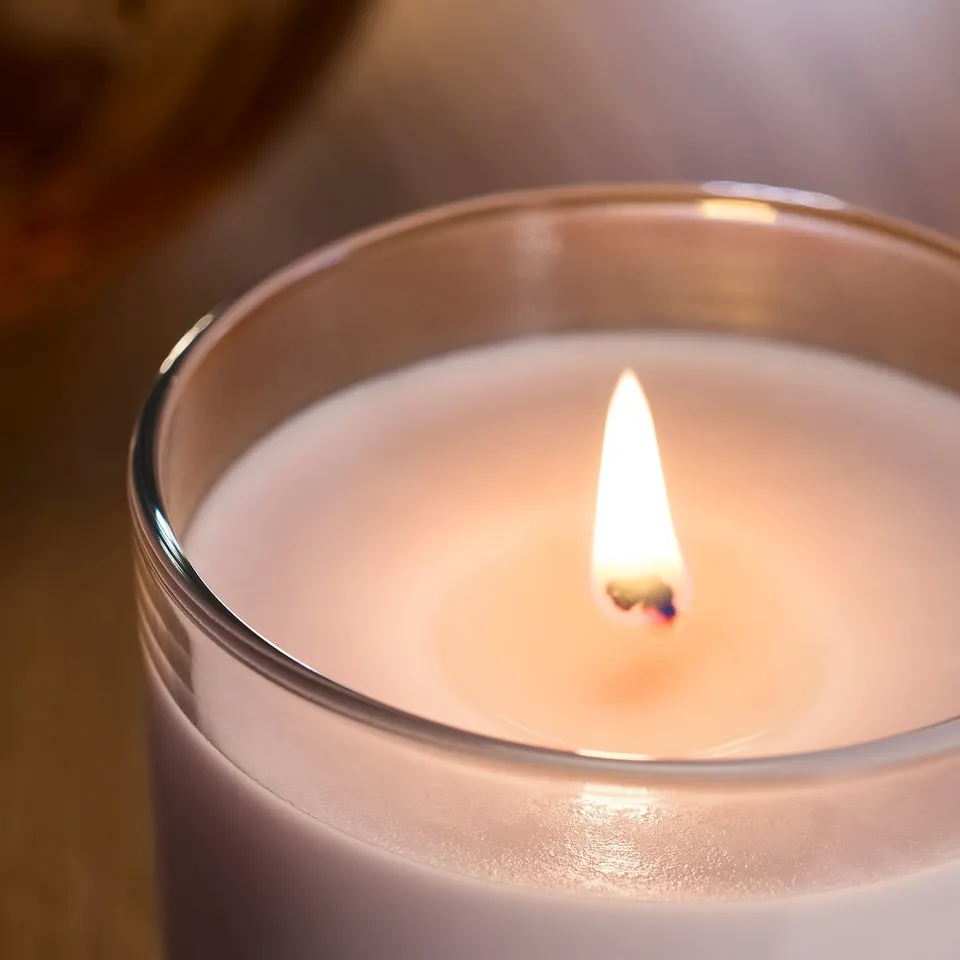 LOTSFÅGEL Scented candle in glass, Pink flowers pale pink, 40 hr