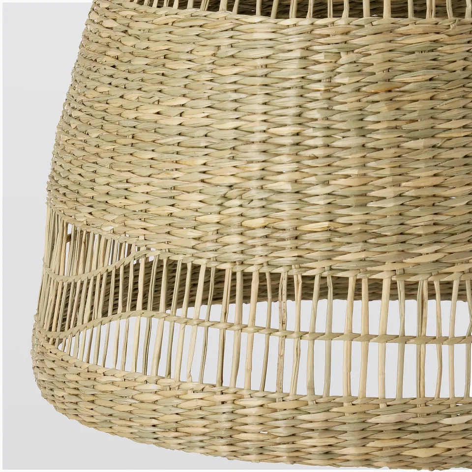 Hand-woven lamp with warm light.