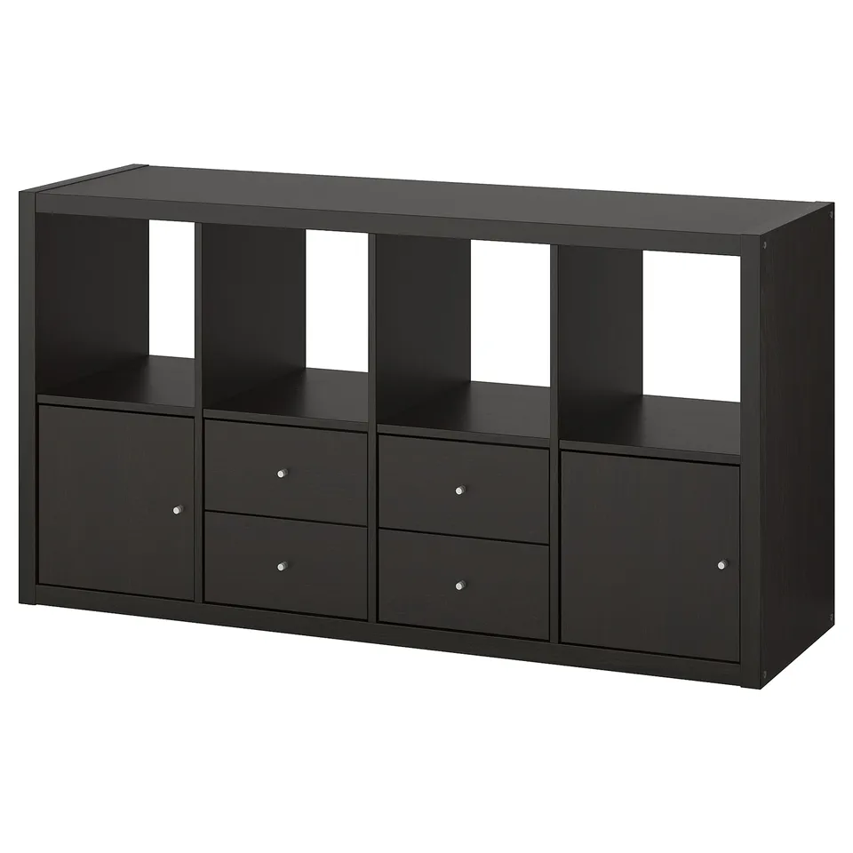 A black ikea KALLAX shelf unit with drawers and open compartments. Its modular design offers versatile storage solutions.