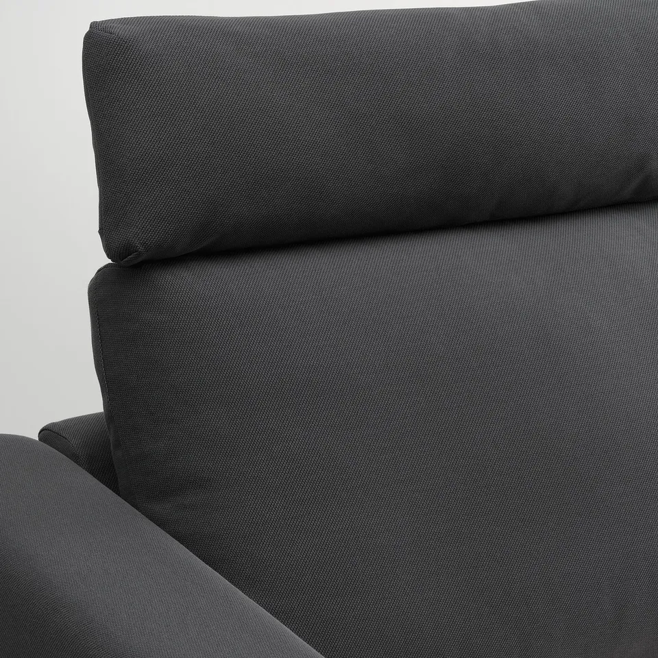 Close up of supportive black VIMLE sofa cushion with textured hallarp fabric.