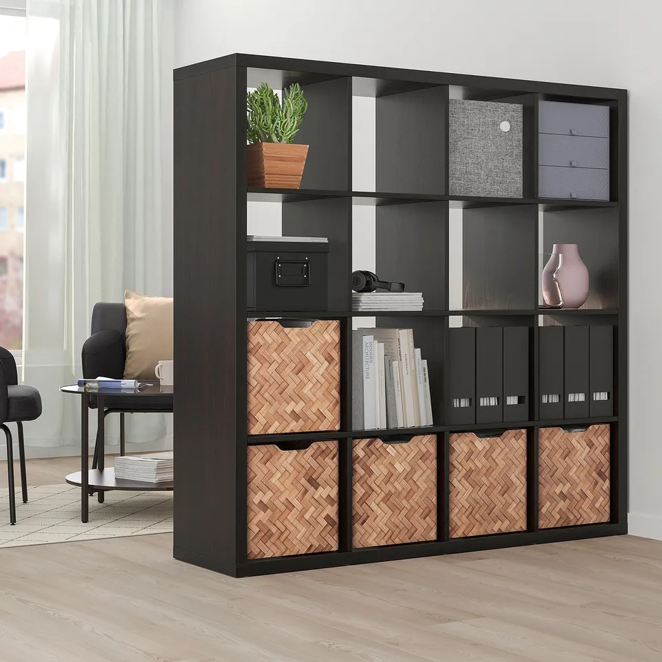 Large black storage unit with woven boxes; fits books, decor, and electronics.
