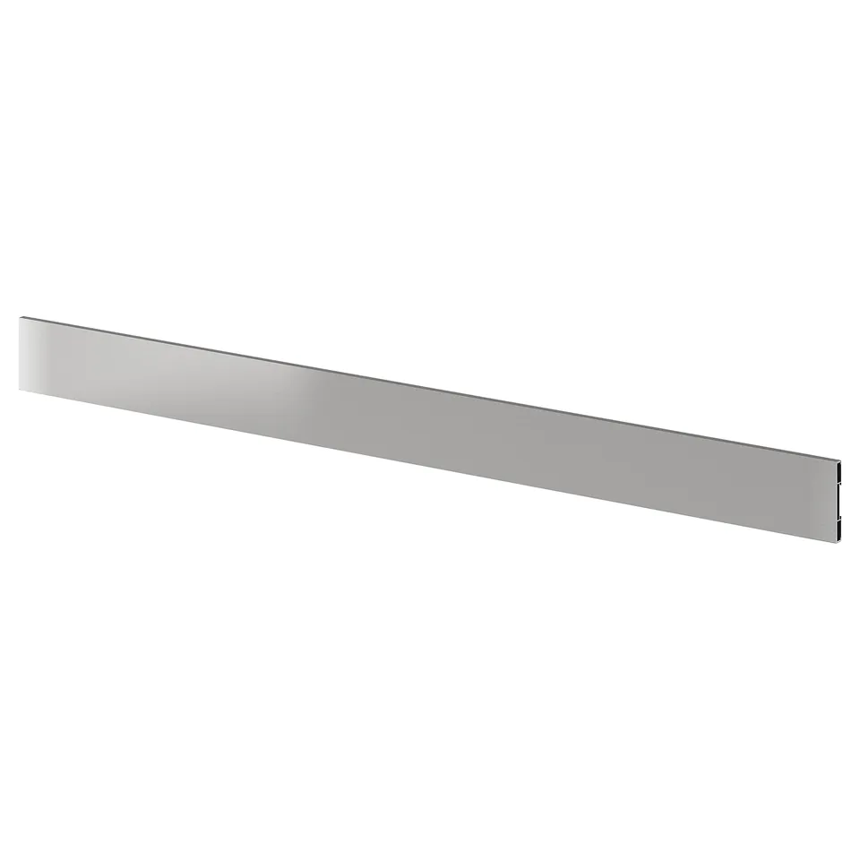 A VÅRSTA stainless steel kitchen plinth. Its long, thin, and rectangular with a metallic, sleek design.