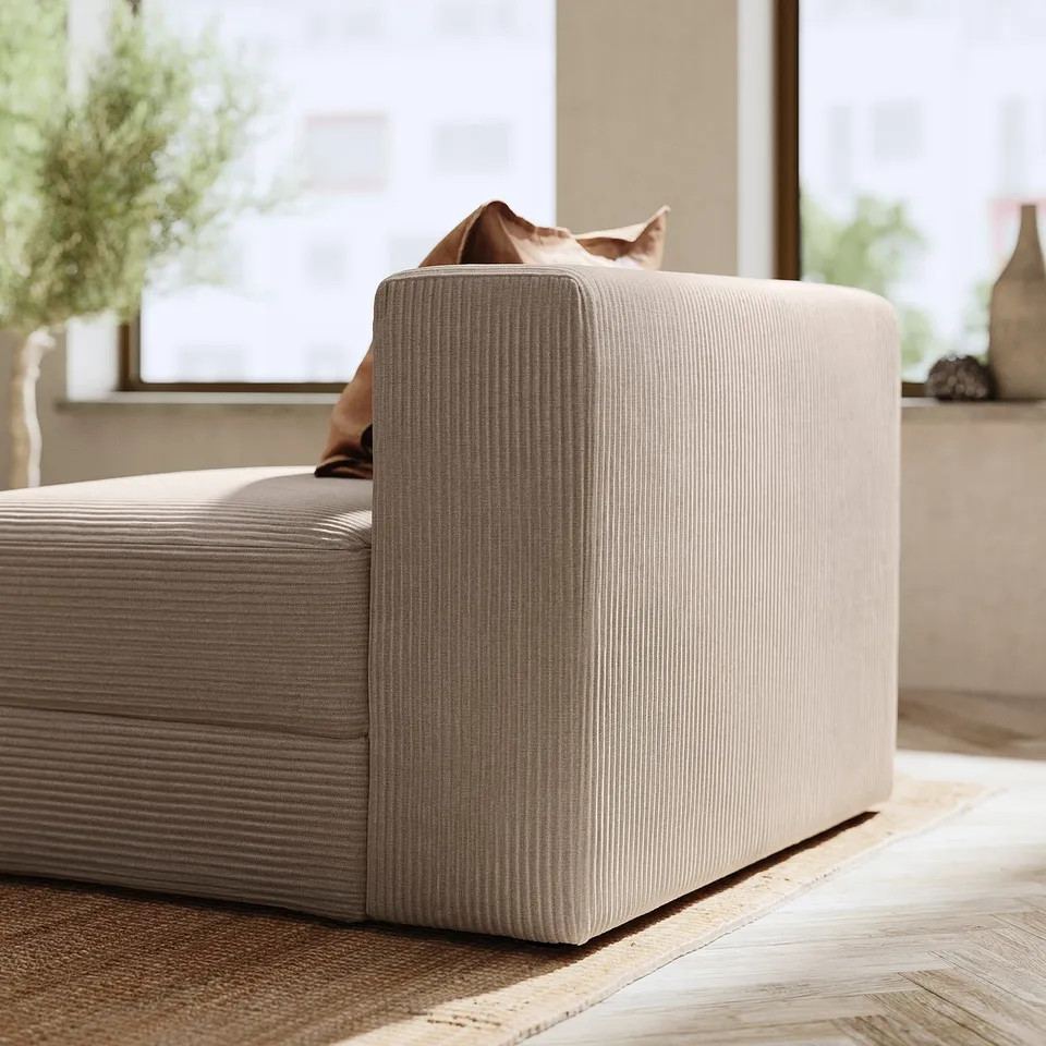 Modern sectional sofa, beige, corduroy, l-shaped, cosy, with cat.