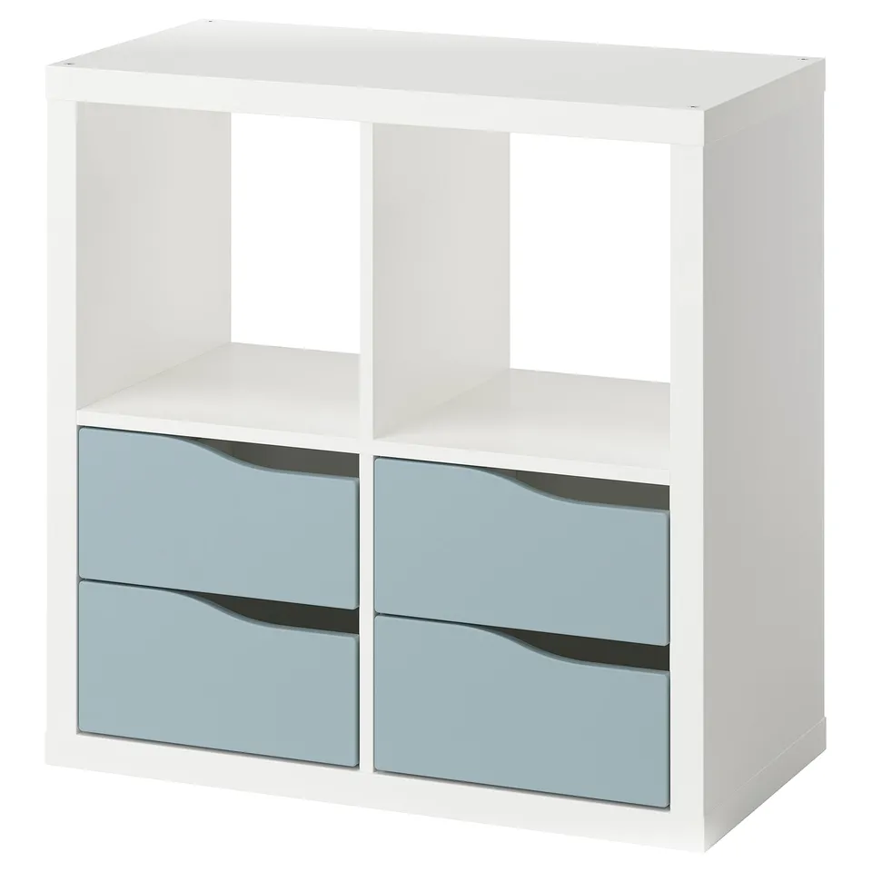 A white KALLAX shelf unit with light blue drawers. It four compartments, two with drawers and two open spaces.