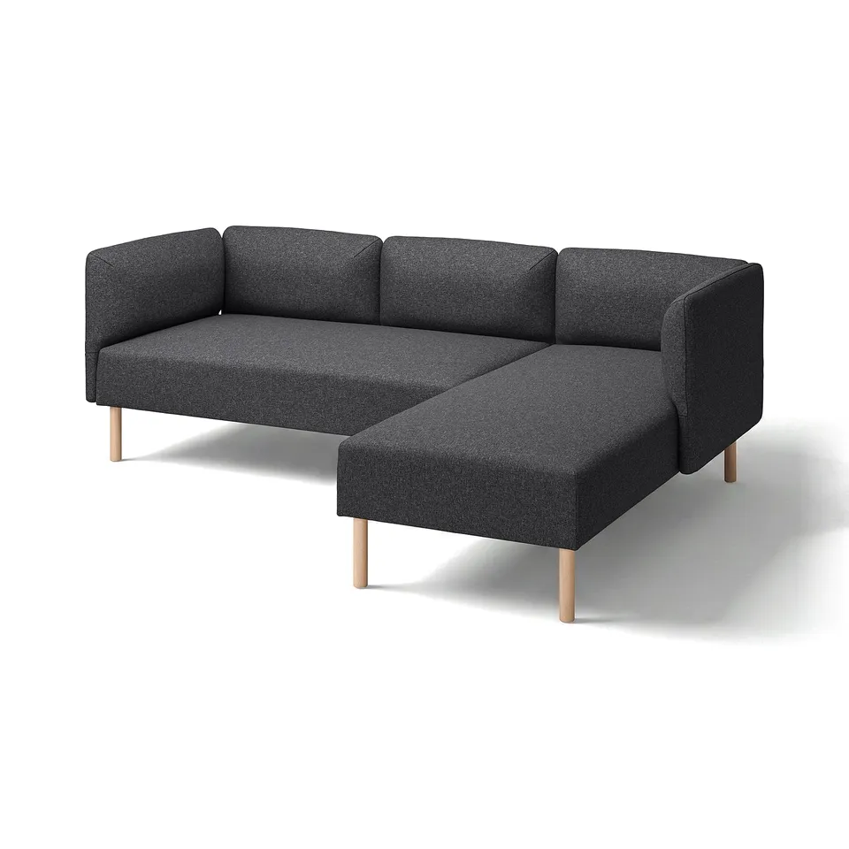 A modern dark grey modular sofa named LILLEHEM, featuring wooden legs, wide cushions, and a cosy, inviting design.