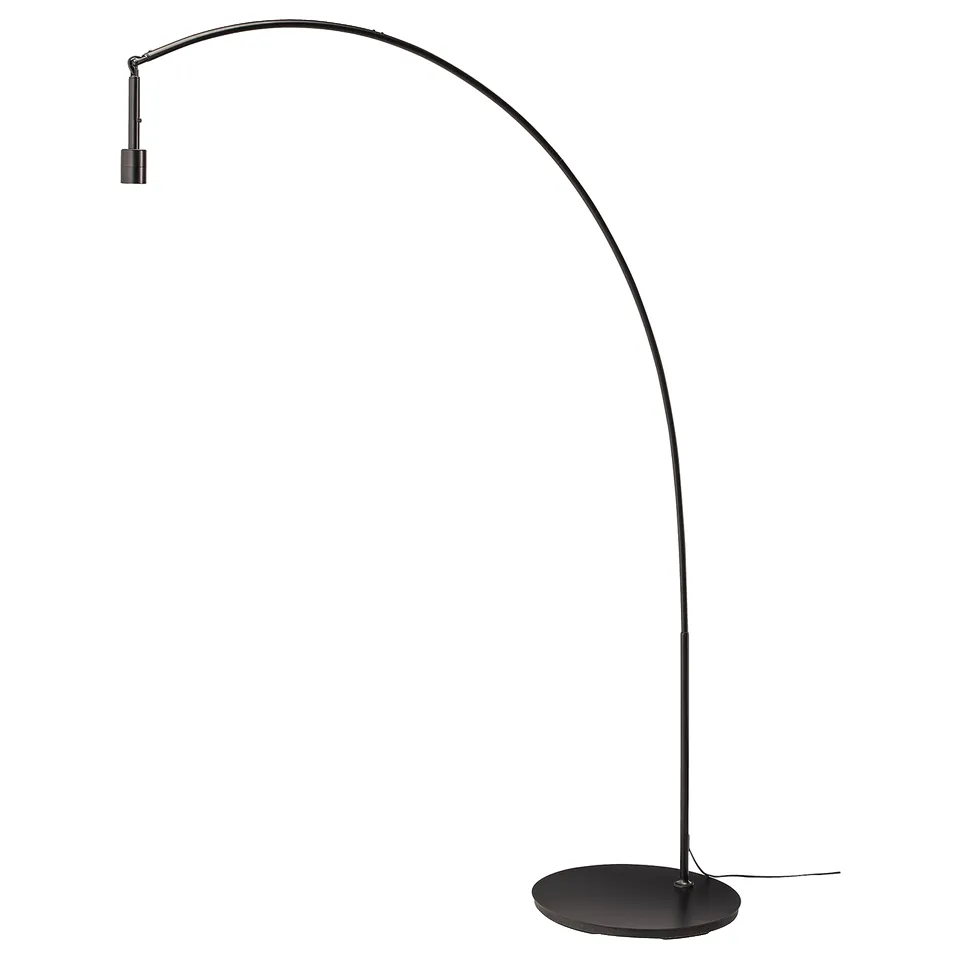 SKAFTET black floor lamp with arched design, combining style and functionality for adjustable lighting.