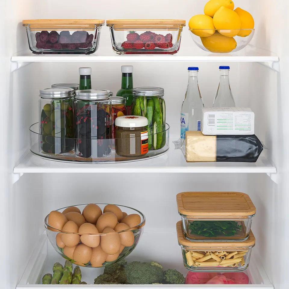 Fridge organiser turntable holding jars and bottles, making contents easily accessible.