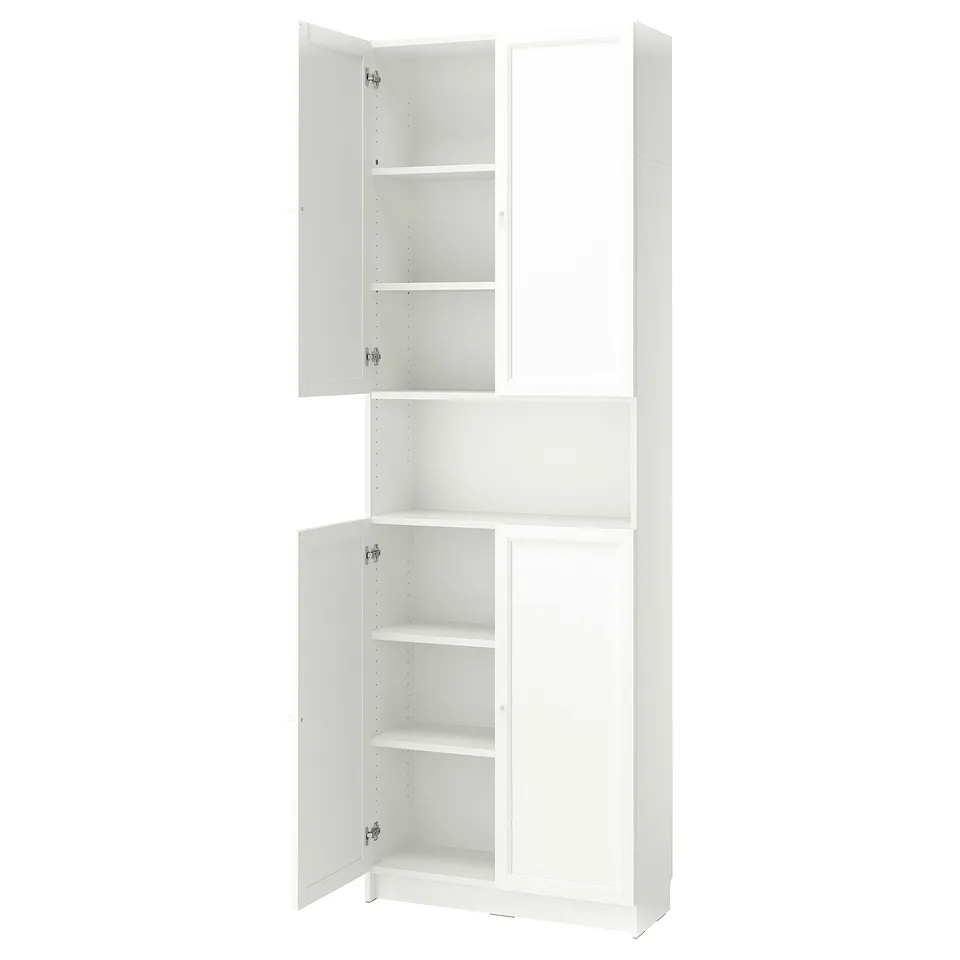 A white BILLY bookcase with both open and closed storage. It multiple shelves for customizable organisation.