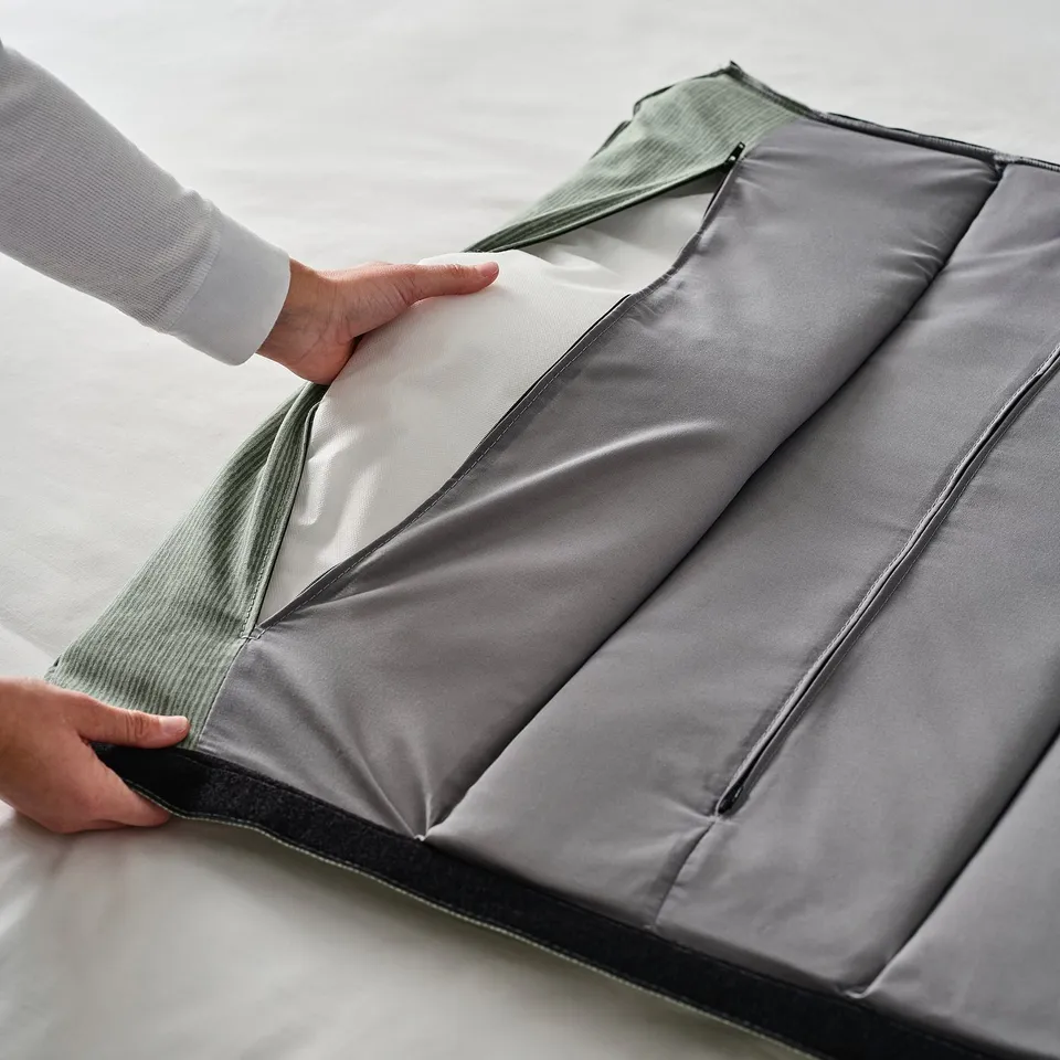 Adjustable bed with removable headboard; easy-to-clean design.