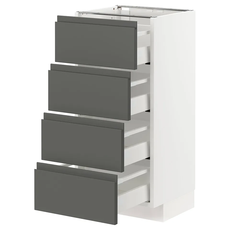 Modern kitchen unit with four grey drawers and white frame, offering sleek and organised storage.