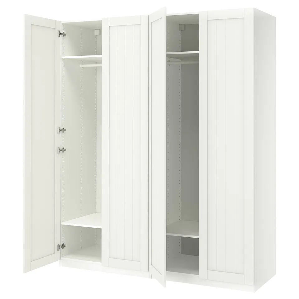 White ikea PAX wardrobe, double doors open, showing interior space.
