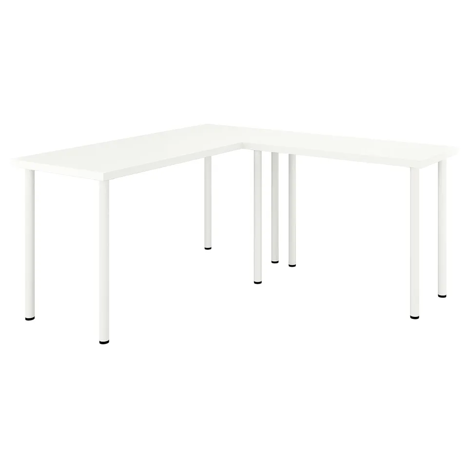 A white LAGKAPTEN corner desk with a sleek design, supported by metal legs.