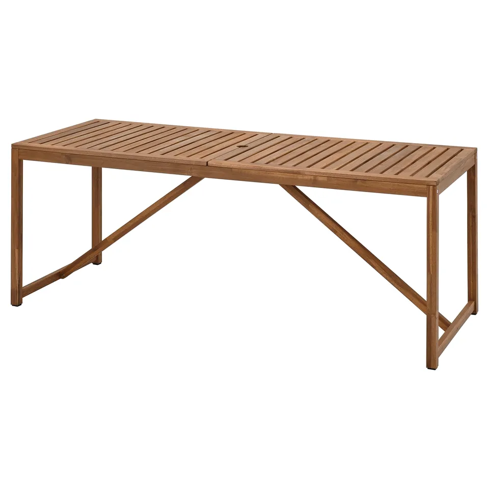 NÄMMARÖ outdoor table, light brown acacia wood, rectangular, sleek design.