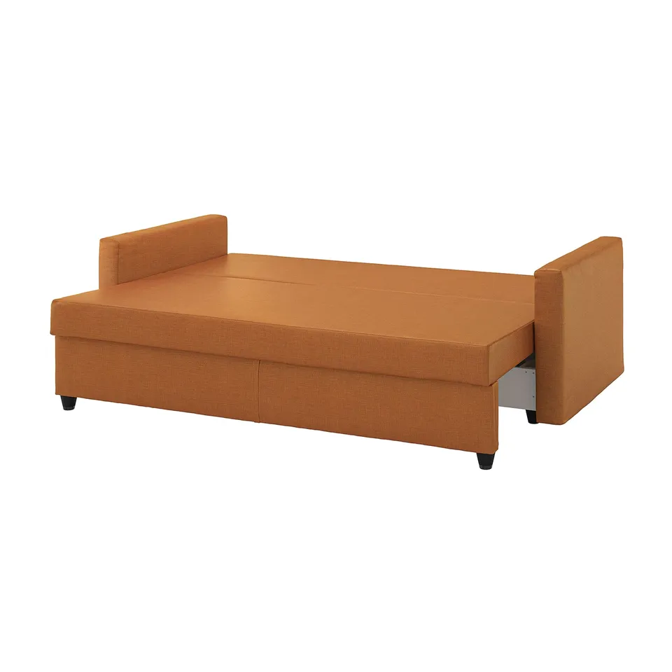 An orange FRIHETEN sofa-bed with storage, boasting a modern, cushioned design for versatile use.