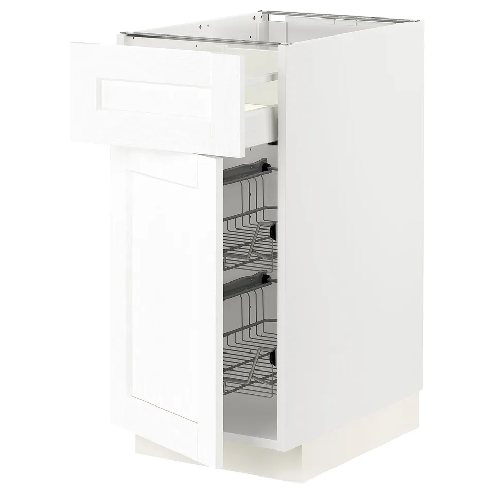 A white METOD kitchen cabinet with pull-out wire baskets for storage.