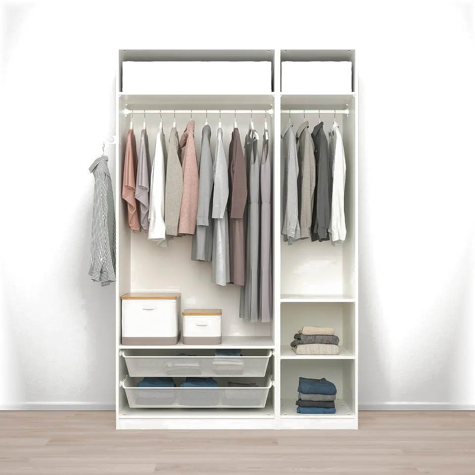 Ordered wardrobe with clothes, shelves, and storage boxes.
