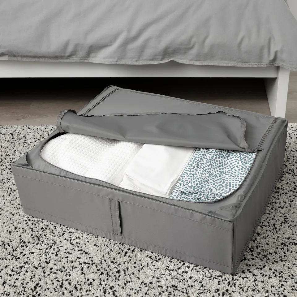 Grey SKUBB storage under-bed case, saves space with ventilation for fresh air.