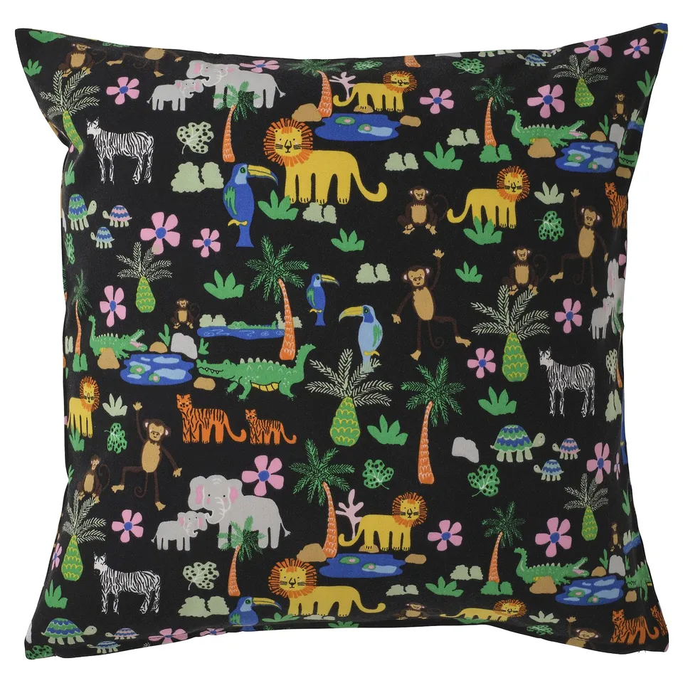 Jungle-themed black throw pillow; includes tigers, lions, and monkeys; recycled polyester.