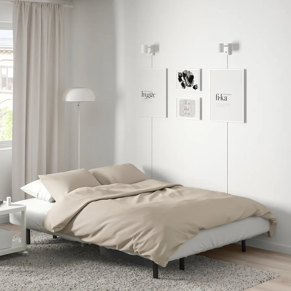 NYHAMN bed, beige, modern minimalist,fits IKEAs aesthetic, sized large.