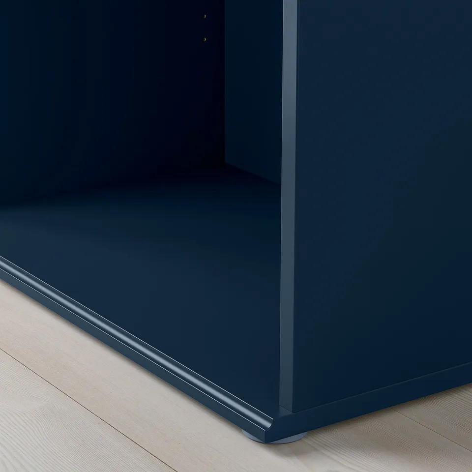Durable blue tv bench with clear, precise edges on wooden floor.