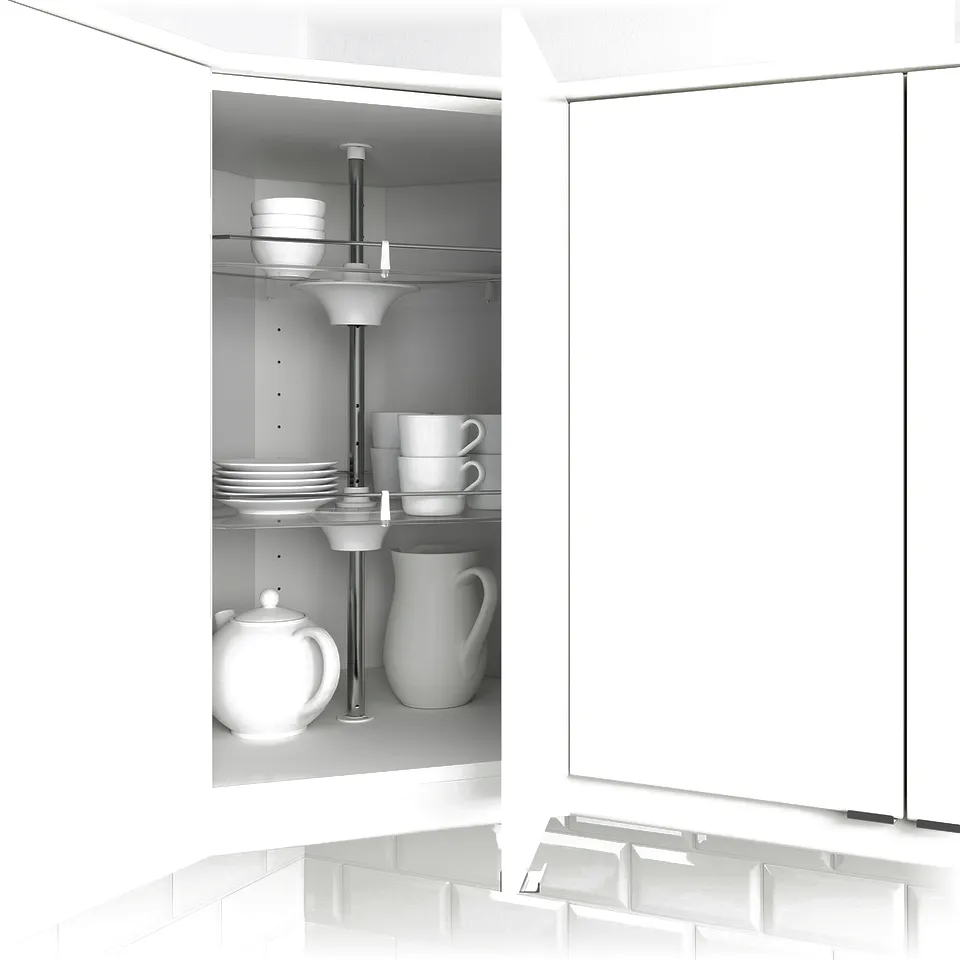 Open kitchen cabinet displaying adjustable shelves with stacked white dishes and cups.