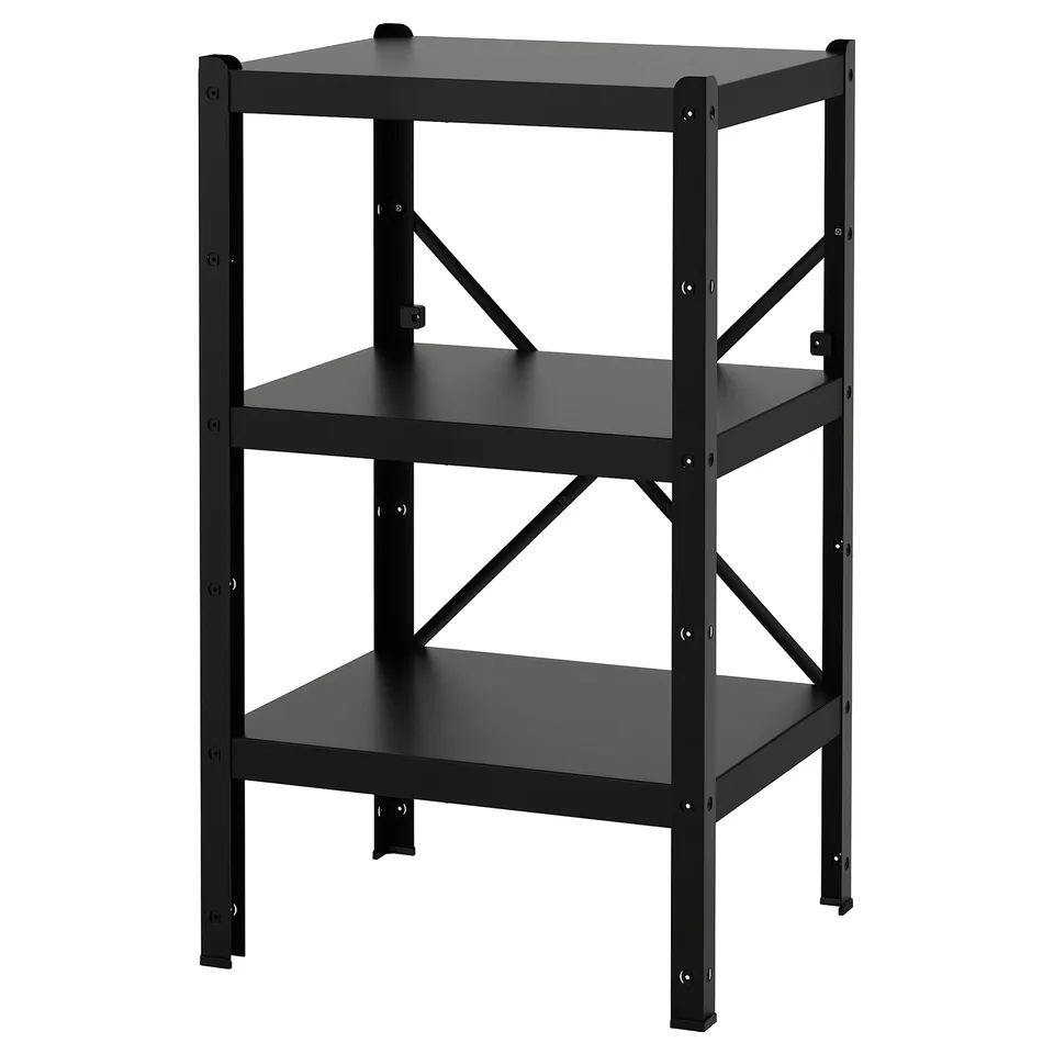 A black metal BROR shelving unit. Its sturdy, durable, and versatile for various rooms.