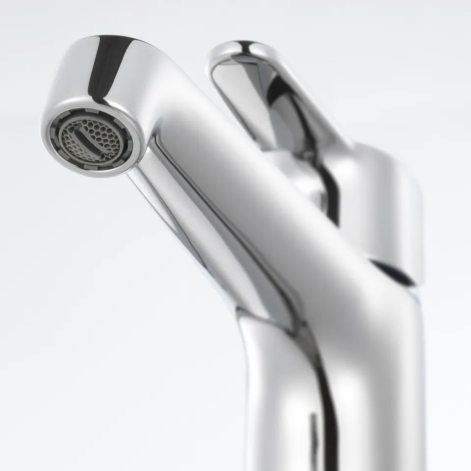 Modern chrome-plated tap with a sleek design, featuring an aerator and durable brass construction.