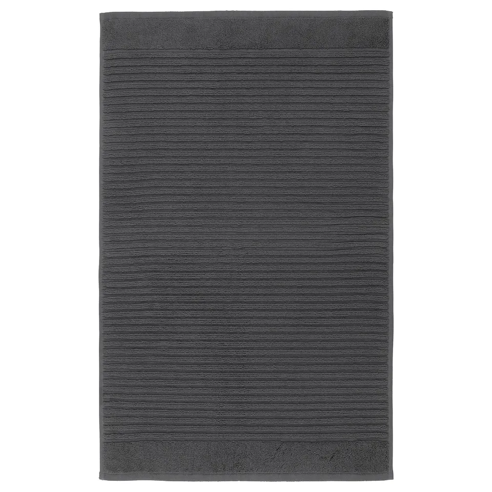 Dark grey rectangular ALSTERN bath mat, pure cotton terry, massaging texture.