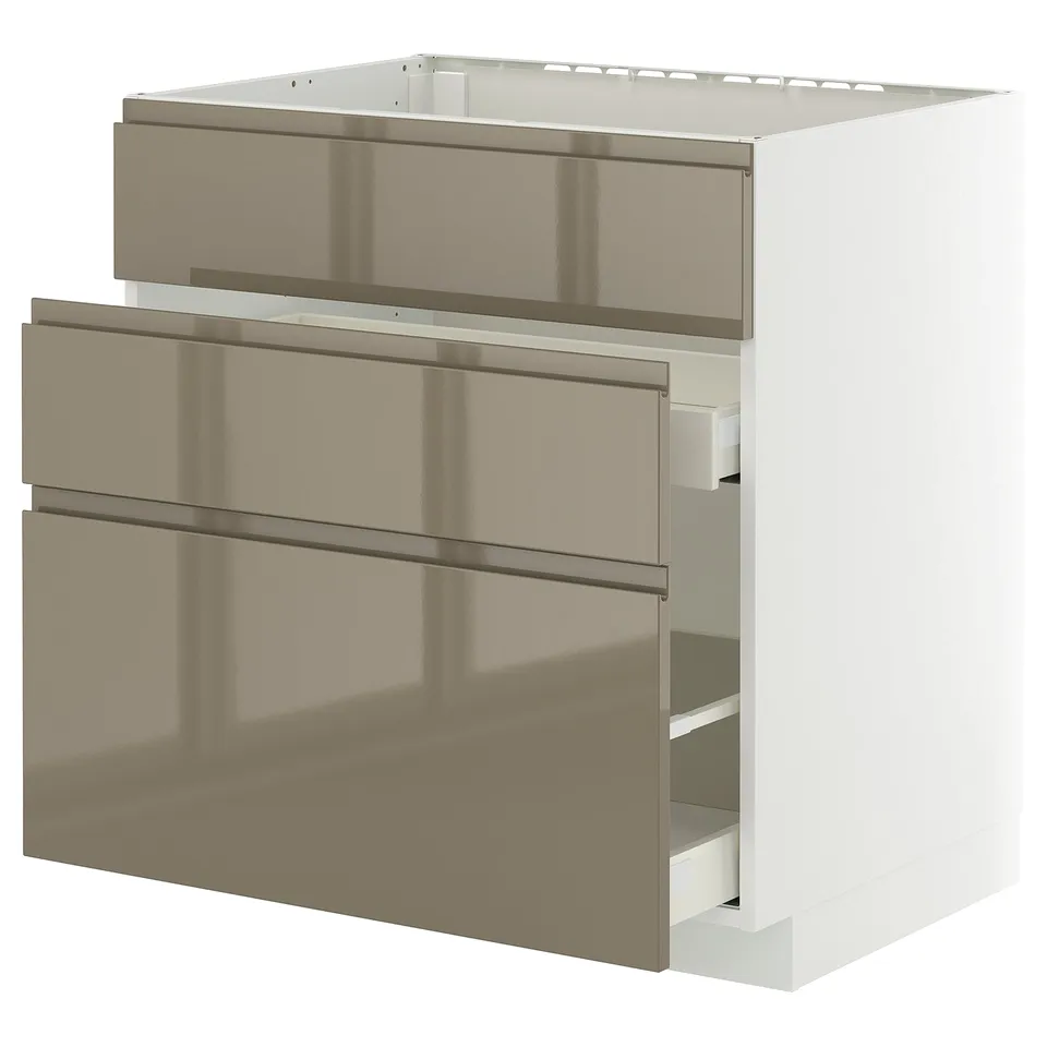 Modern metallic drawer unit from METOD kitchen system, dark grey-brown fronts with integrated handles, on a white base.