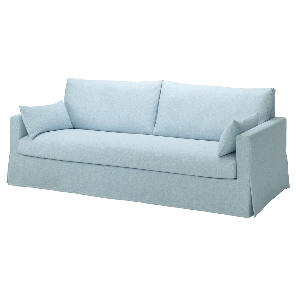 Light blue sofa, clean lines, soft cushions, inviting & comfortable.