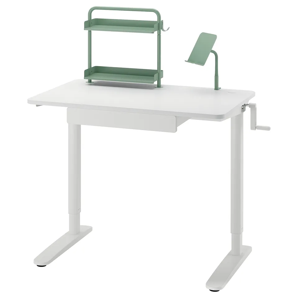 Adjustable white desk with green organiser and phone stand. Ideal for kids, with shelves, drawer, and hooks.