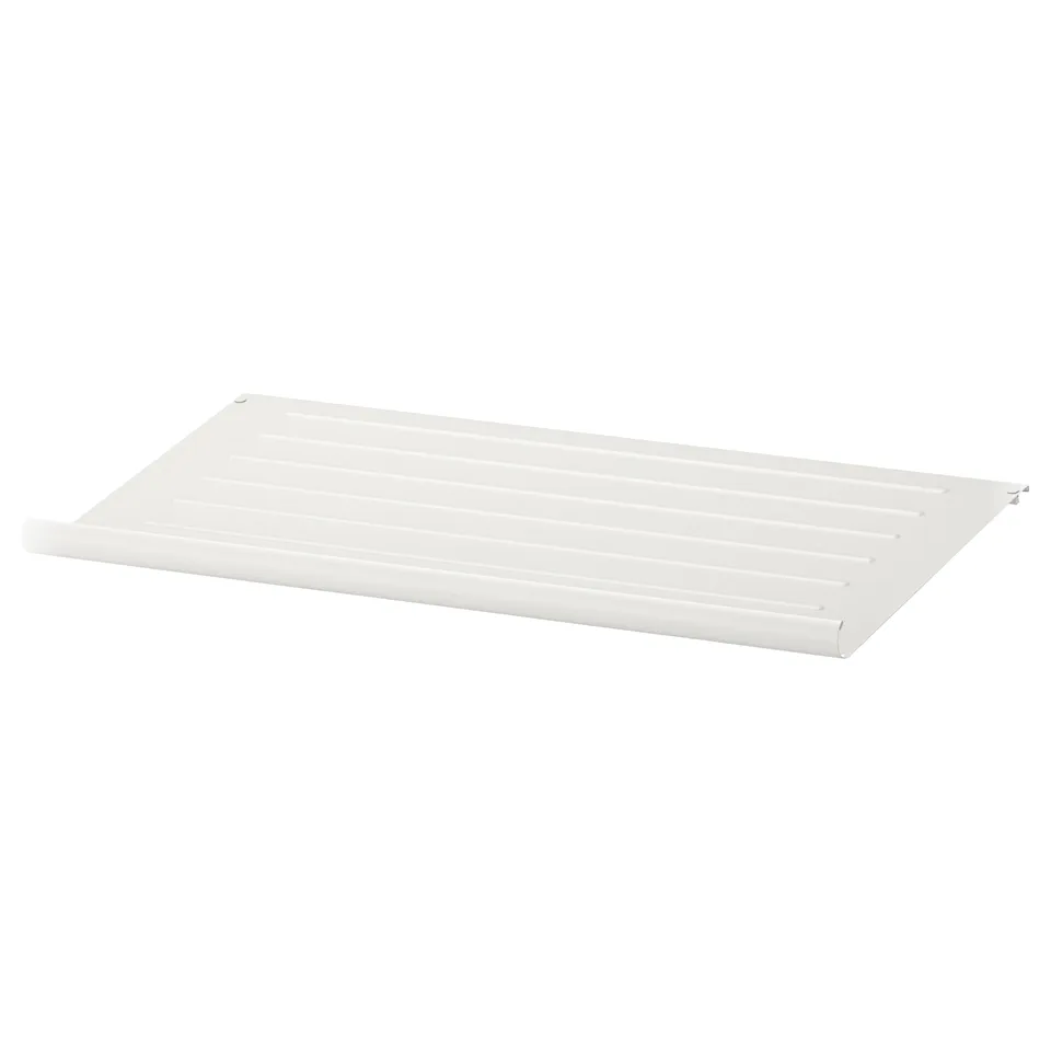 A white KOMPLEMENT shoe shelf made of metal, featuring a slanted design for easy visibility and access.