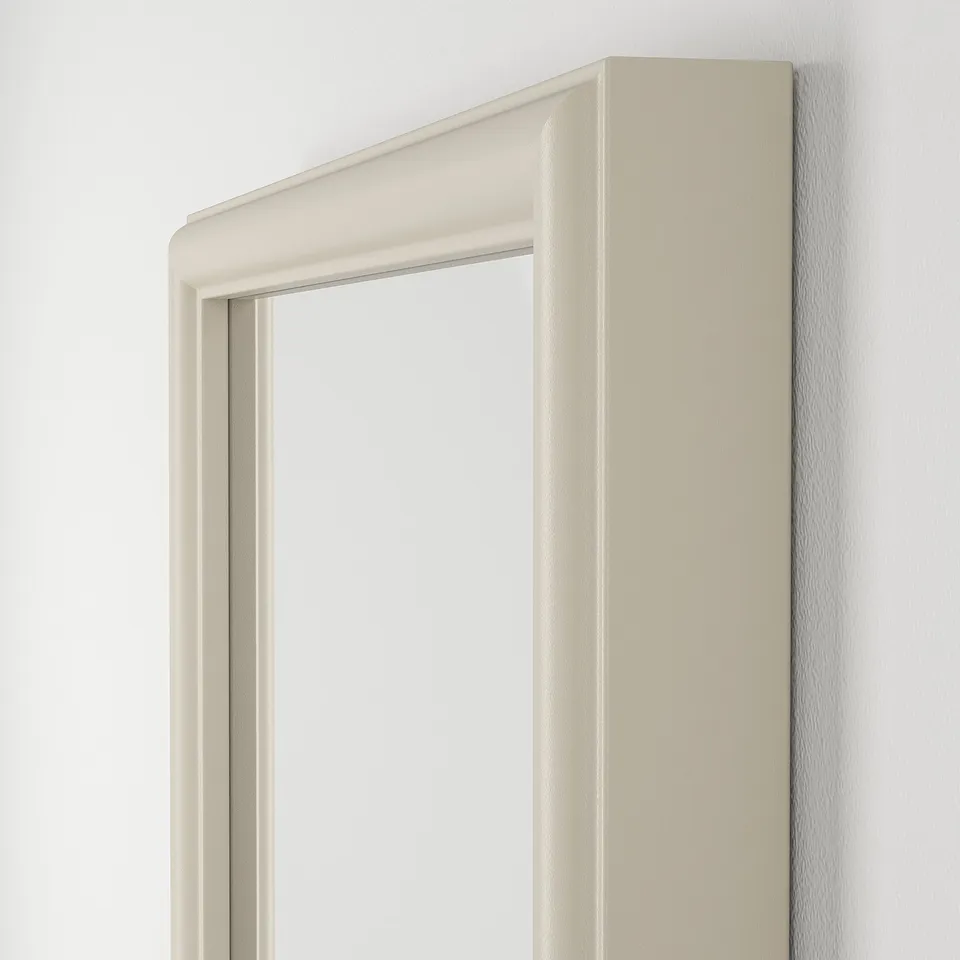 Elegant rectangular mirror with slim, light-colored frame. High-quality design, precise craftsmanship evident.
