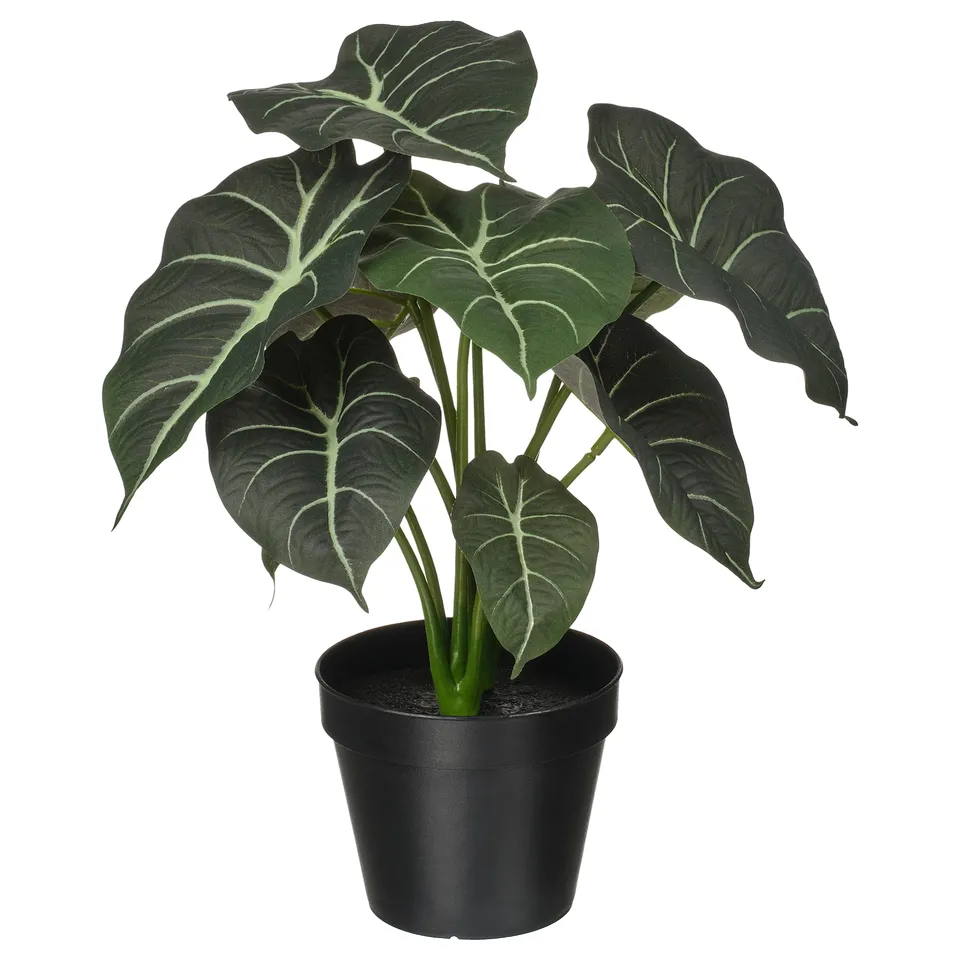 Black-potted artificial green leafy plant, realistically designed with recycled materials.