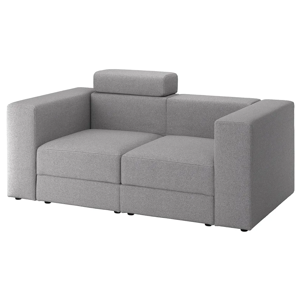Grey modular sofa, comfy, versatile.