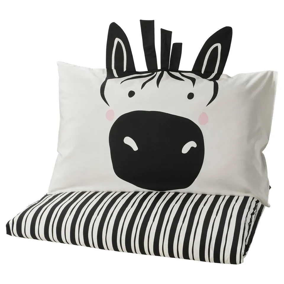 Zebra-themed kids bedding set, black and white, soft cotton blend, playful design.