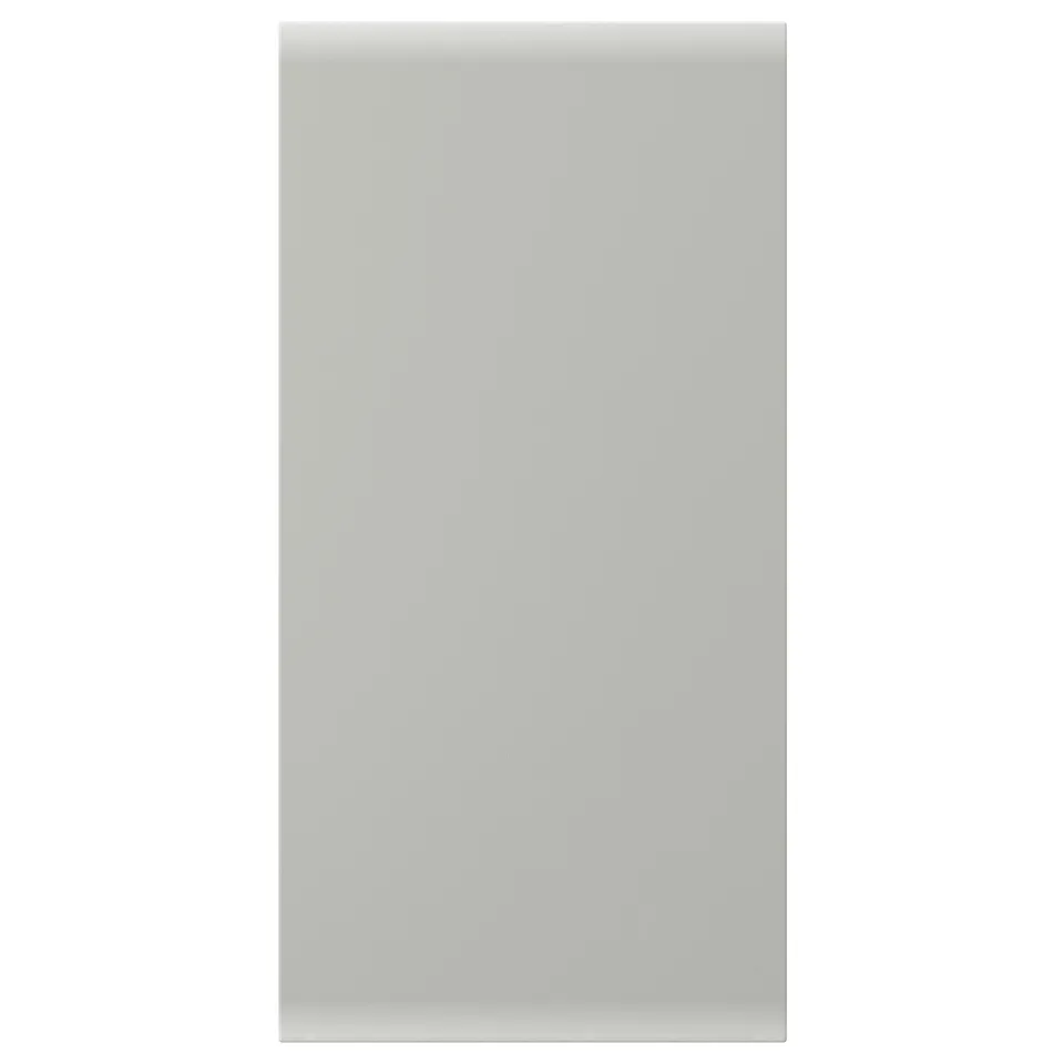 A light grey HAVSTORP kitchen cabinet door with a smooth, seamless finish. Its rectangular, made from acrylic paint and fibreboard.