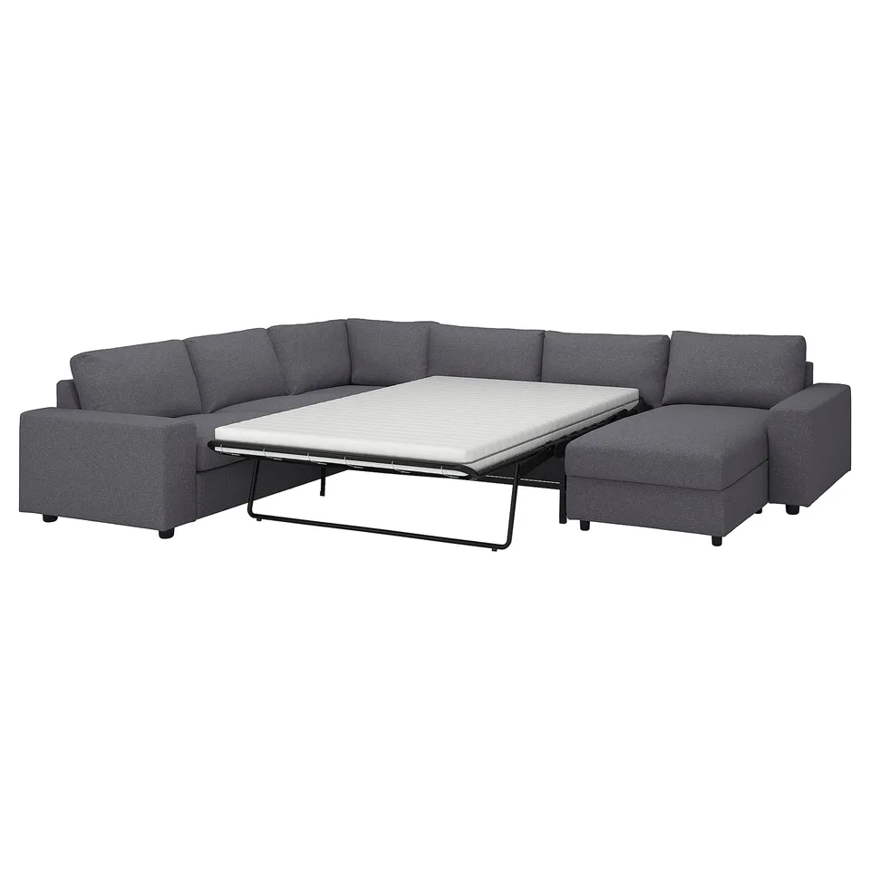 VIMLE sectional sofa in grey fabric with pull-out bed, l-shaped design.