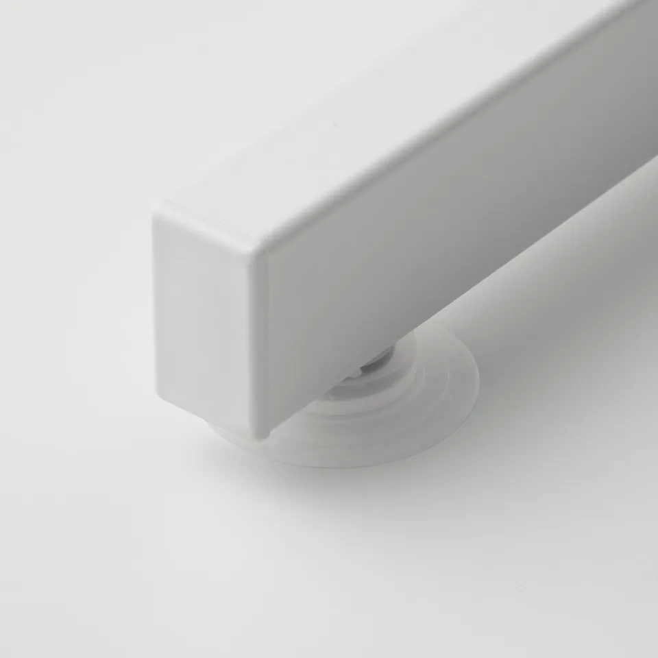 Close-up of dish drainers sturdy, powder-coated steel leg with stable suction cup.