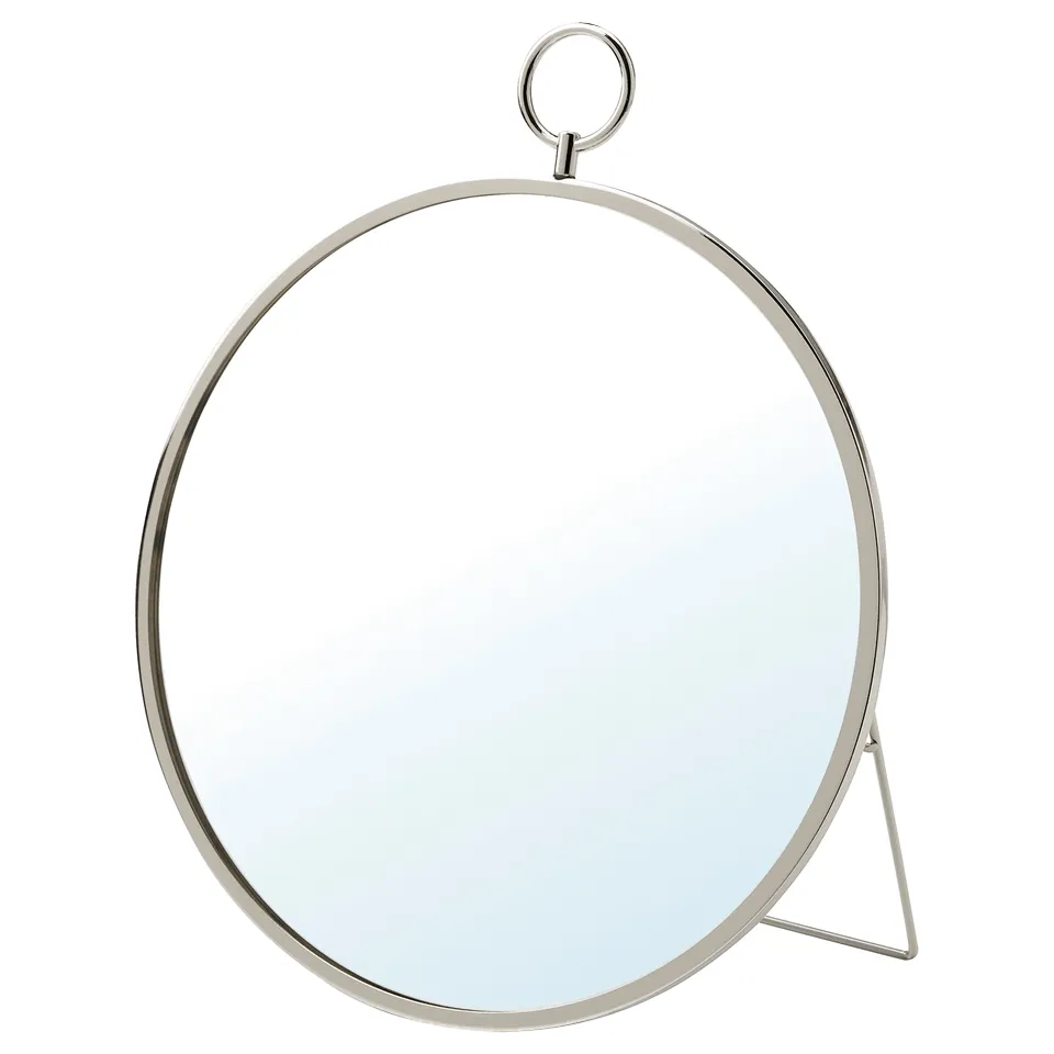 Round nickel mirror with wall hook and stand. Elegant, functional design.